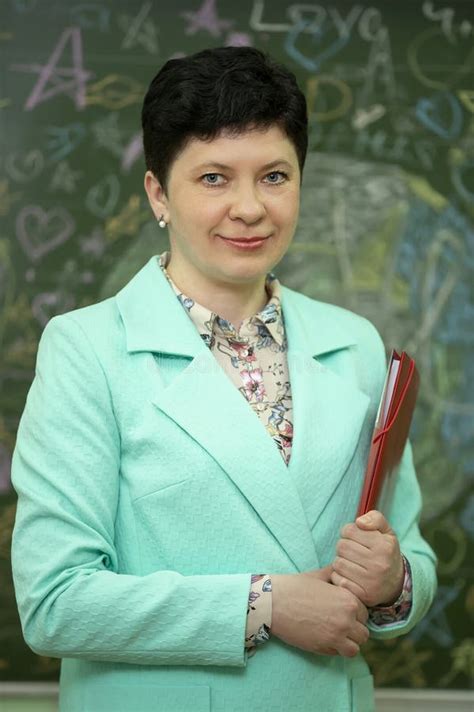Portrait Of A School Teacher Stock Photo Image Of Happy Green 270636084