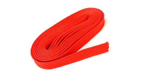 Fabric Rope In Red Color Folded In A Coil Red Rope On White Background