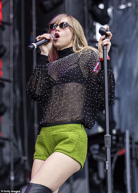 Suki Waterhouse Stuns In A Sheer Pearl Blouse And Green Hot Pants As She Performs At The Th