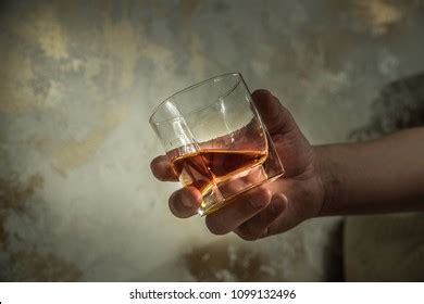 Hand Holding Whisky Glass Photos And Images Shutterstock