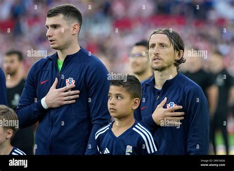 Croatia S Luka Modric Left Croatia Goalkeeper Dominik Livakovic Line