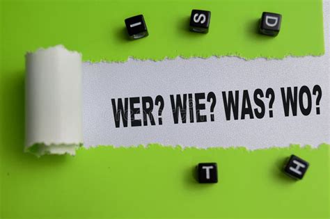 Concept of Wer? Wie? Was? Wo? Text Written in Torn Paper Stock Image ...