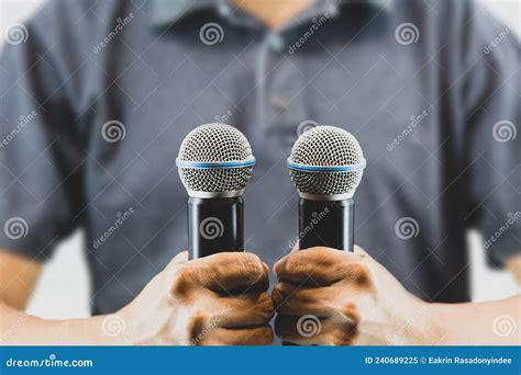 Close Up Hand Holding Microphone for Speaker Speech Presentation Stage ...