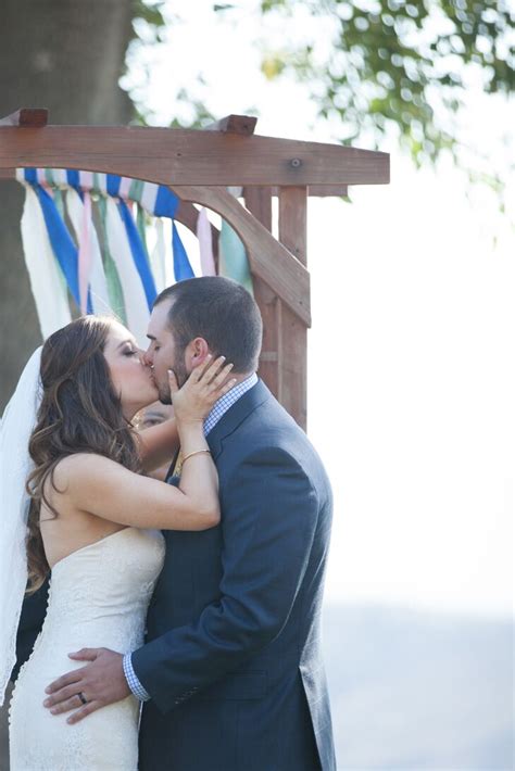 Bride And Groom Ceremonial First Kiss