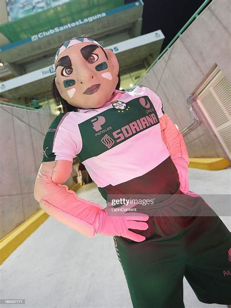 Mascot of Santos Laguna pose for a photo before a match between... News ...