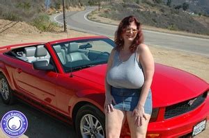 Hot Toni KatVixen Posing By A Red Car XXX Dessert