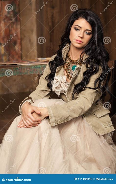 Nice Brunette Woman In Tulle Skirt On Vintage Background Stock Image