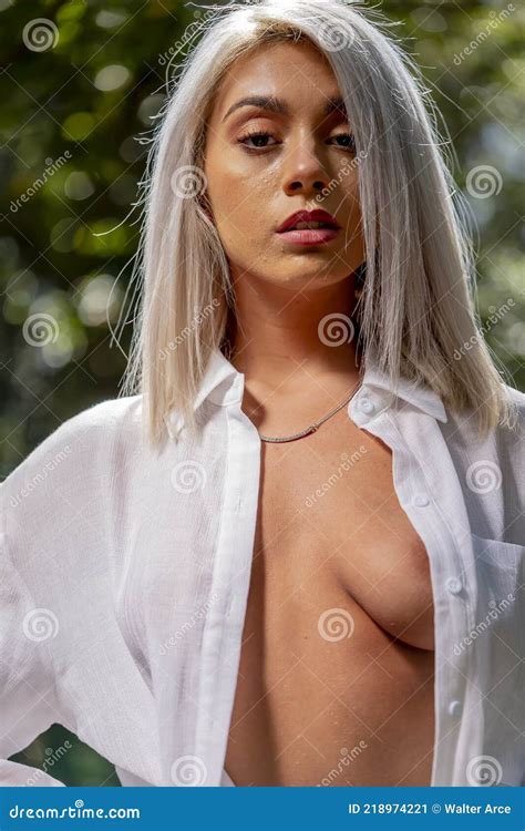 Lovely Implied Nude Blonde Model Enjoying A Day Near The Beach Stock