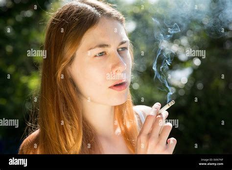 Girl Woman Smoke Smokes Smoking Smoker Smokers Cigarette Hi Res Stock