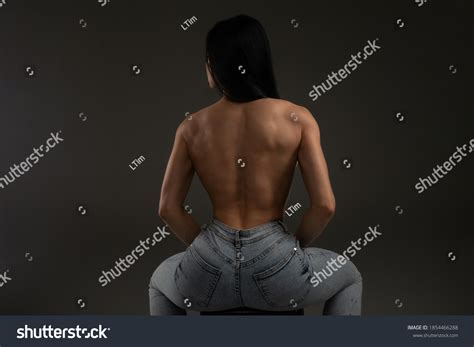 Attractive Brunette Blue Jeans Against Grey Stock Photo 1854466288 Shutterstock