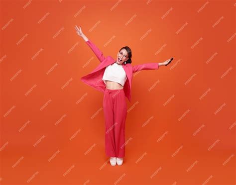 Free Photo Woman Smiling Arms Raised Up Celebrating Winner
