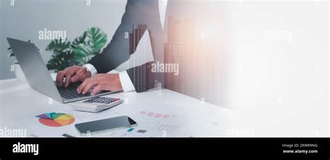 Business Accounting Concept Business Uses Calculator With Laptop