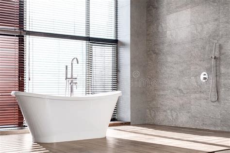 Luxury Bathroom Interior In Minimalistic Style With Modern Bathtub In