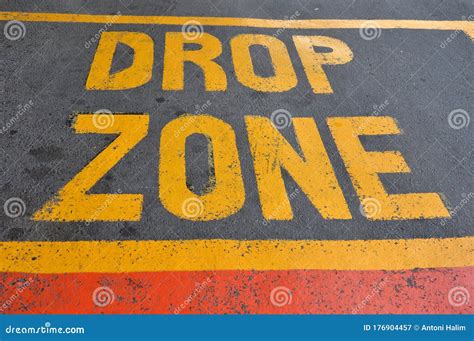 Drop Zone Sign Or Drop Off Sign On The Board At Airport With Blurred