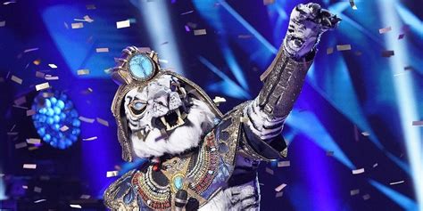 Who Is The Masked Singer S White Tiger Here Are Our Best Guesses Black Jaguar Singer Tiger Love