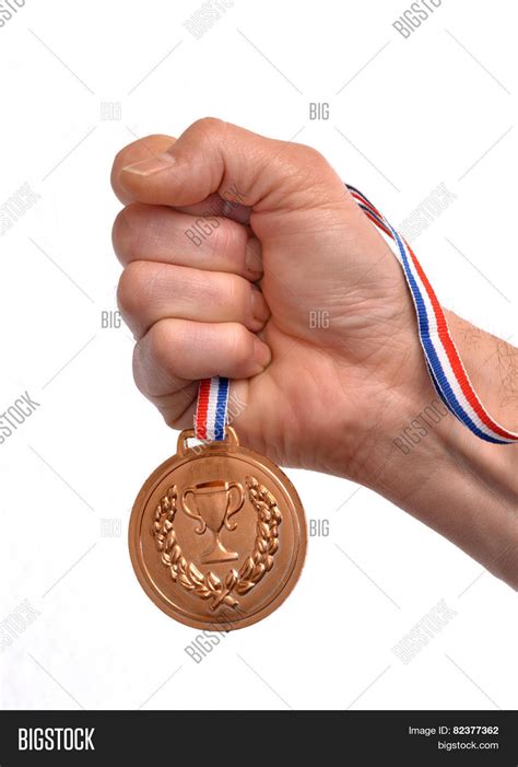 Athlete Hand Holding Gold Medal Image Photo Bigstock