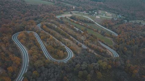 Birds Eye View Of Mountains With Winding Road Durign Autumn Stock Image