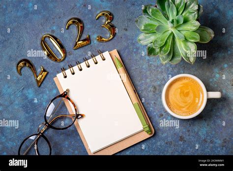 New Year Goals 2023 On Desk 2023 Resolutions List With Notebook