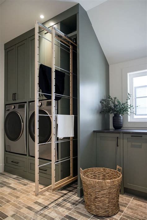 Modern Laundry Room With Custom Millwork In North Glenmore Park