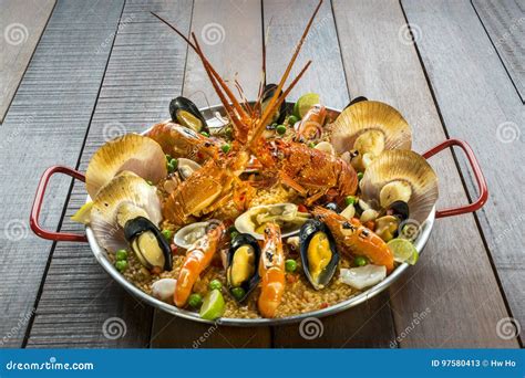 Paella With Fresh Lobster Scollops Mussels And Prawn Stock Image