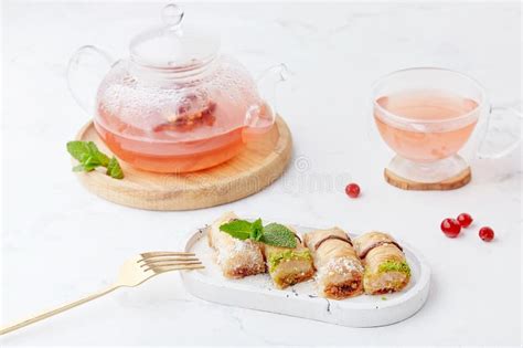 Natural Healthy Cranberry Tea With Traditional Turkish Dessert Baklava