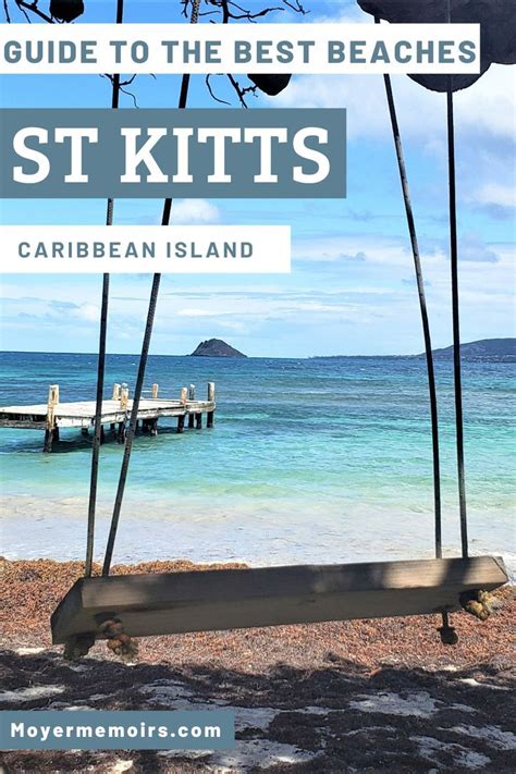 Blue Ocean Water Near A Beach With A Swing And A Pier On St Kitts