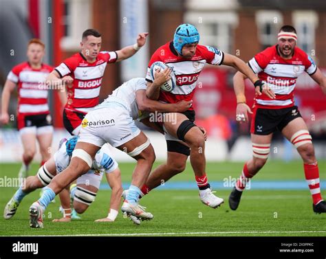 Gloucesters Zach Mercer Is Tackled By Exeter Chiefs Greg Fisilau