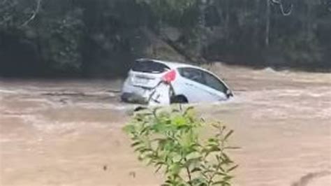 Queensland Floods Car Swept Away In Floodwaters Near Springbrook The Courier Mail