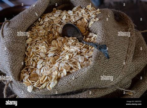 Rolled Oats Or Oat Flakes In Jute Bag Stock Photo Alamy