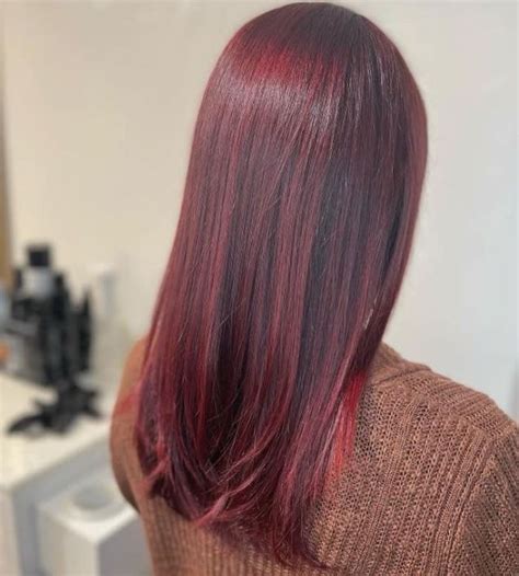 The Rise Of Cherry Coke Hair A Trend To Watch In 2024 Hair Color