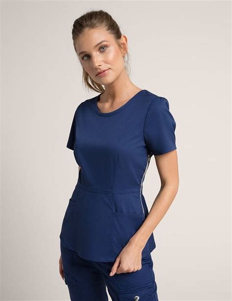 The Peplum Top In Estate Navy Blue Is A Contemporary Addition To Women