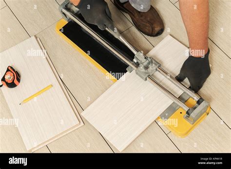 Laying Ceramic Tiles Tiler Cuts Tile Manual Cutter Stock Photo Alamy