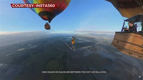 Man Walks Across 2 Hot Air Balloons 6236 Feet Above The Ground Youtube