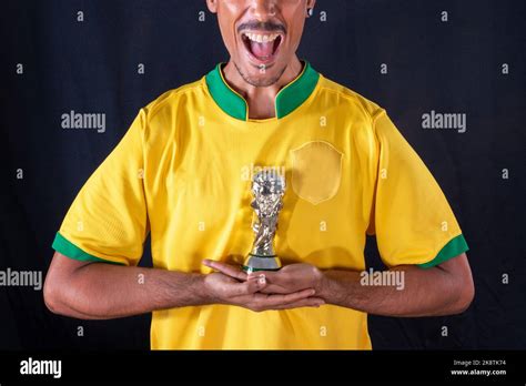 Brazilian Football Black Player Holding Winner Trophy And Celebrating