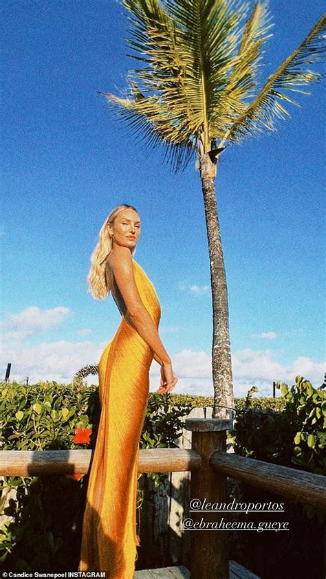 Candice Swanepoel Shows Off Her Stunning Figure In Tiny Citrus Hued String Bikini In Brazil