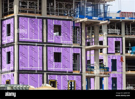 Construction Site New Tower Apartment Buildings Siniat Weather Defence Purple Wrap Over