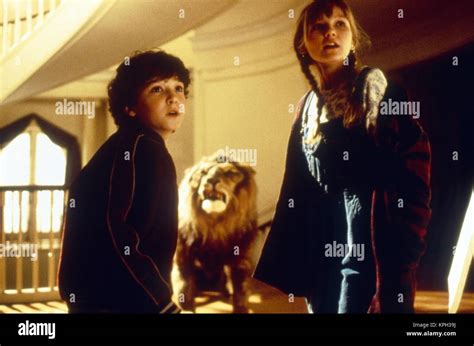 Jumanji Year : 1995 USA Director : Joe Johnston Kirsten Dunst, Bradley ...