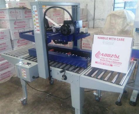 Manual Carton Taping Machine Cartoon Tapping Machine Mh Fj D