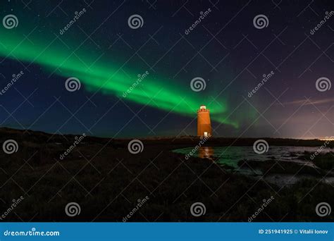 Lighthouse on Reykjanes Peninsula Under Nortern Lights. Iceland Stock ...