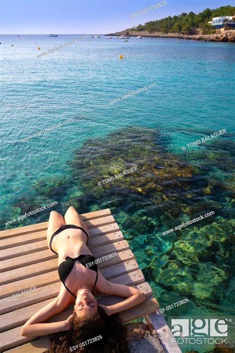 Ibiza Bikini Girl Relaxed At Portinatx Beach Pier In Balearic Islands