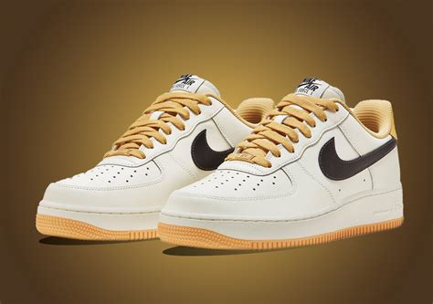 Bold Gold Accents Arrive On This Nike Air Force 1 Low Sneaker News