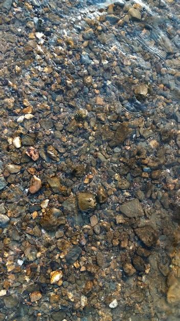 Premium Photo Close Up View Of Smooth Round Pebble Stones On The Beach