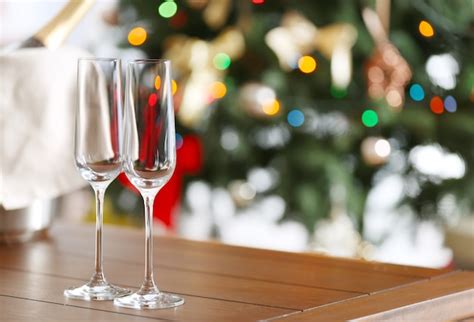 Premium Photo Empty Champagne Glasses On Wooden Table