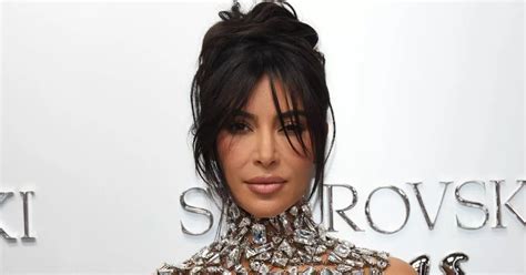 Kim Kardashian Dazzles In Nearly Naked Top As She Celebrates Swarovski And Skims Collab Mirror