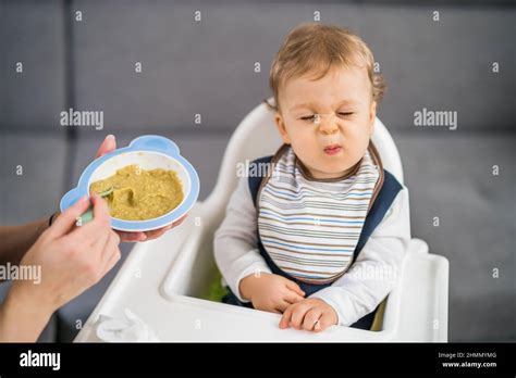 Angry Baby Boy Doesn T Want To Eat Stock Photo Alamy