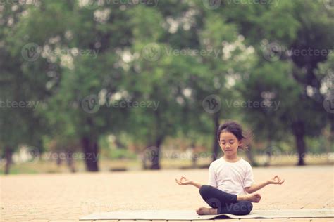 Page 2 Child Meditating Stock Photos Images And Backgrounds For Free