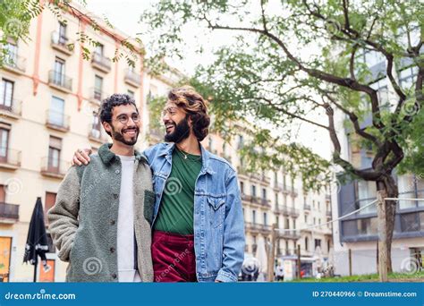 Happy Couple Of Gay Men Walk Embracing Stock Photo Image Of Flirting