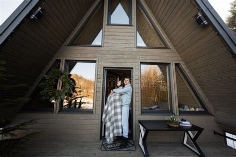 Couple In Love On Terrace Off Grid Tiny House In The Mountains Stock