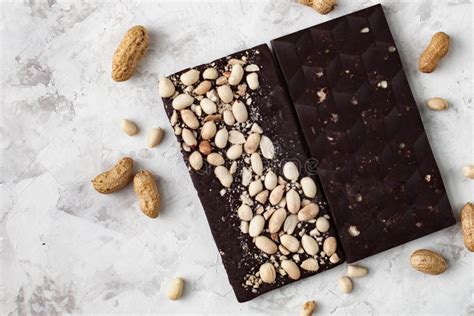 Chocolate bar with nuts stock image. Image of white - 180675701