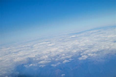 White Clouds Looking from the Plane Stock Photo - Image of business ...